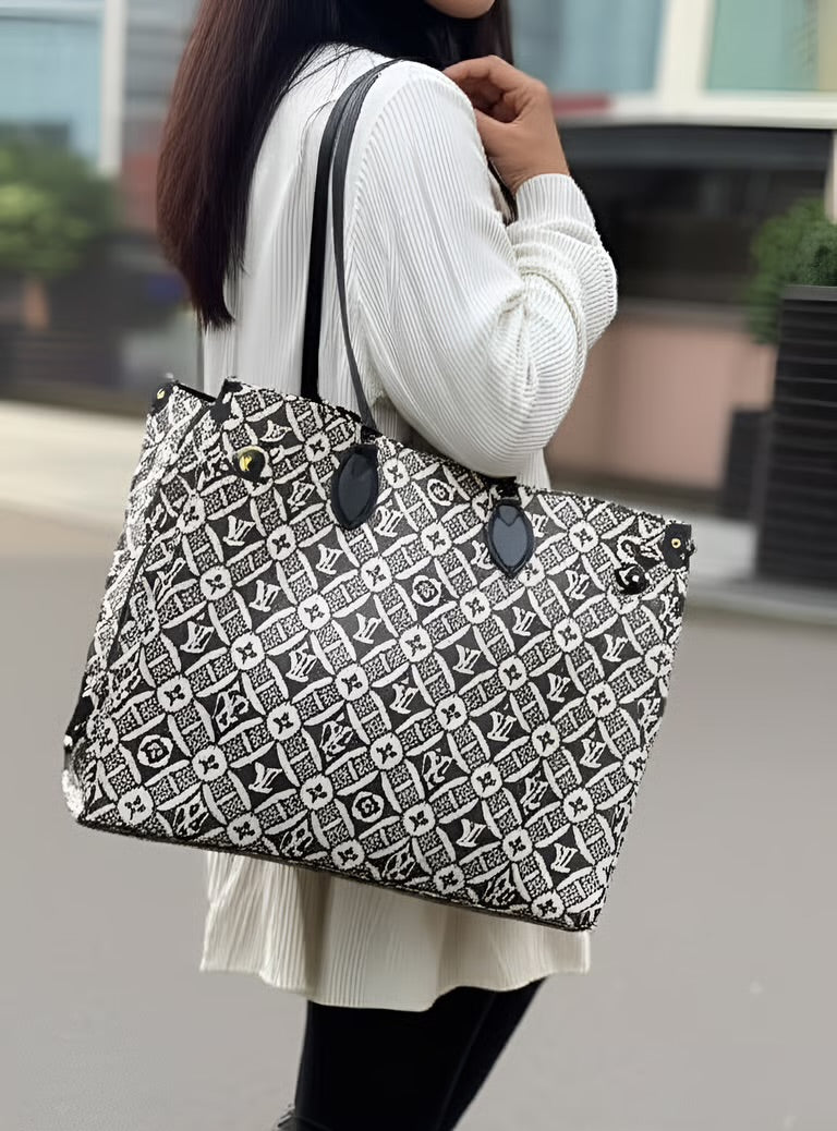 Preloved Louis Vuitton Since 1854 Canvas On The Go GM Monogram 00222025OPUL